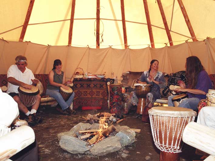 People having fun in the tipi